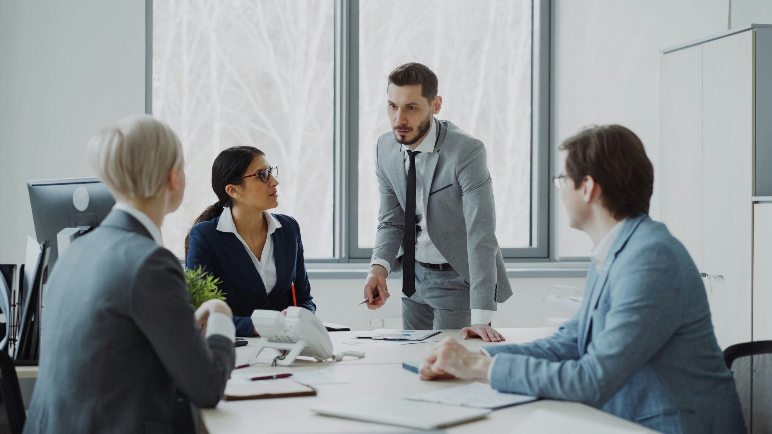 The Syngco team in a client meeting